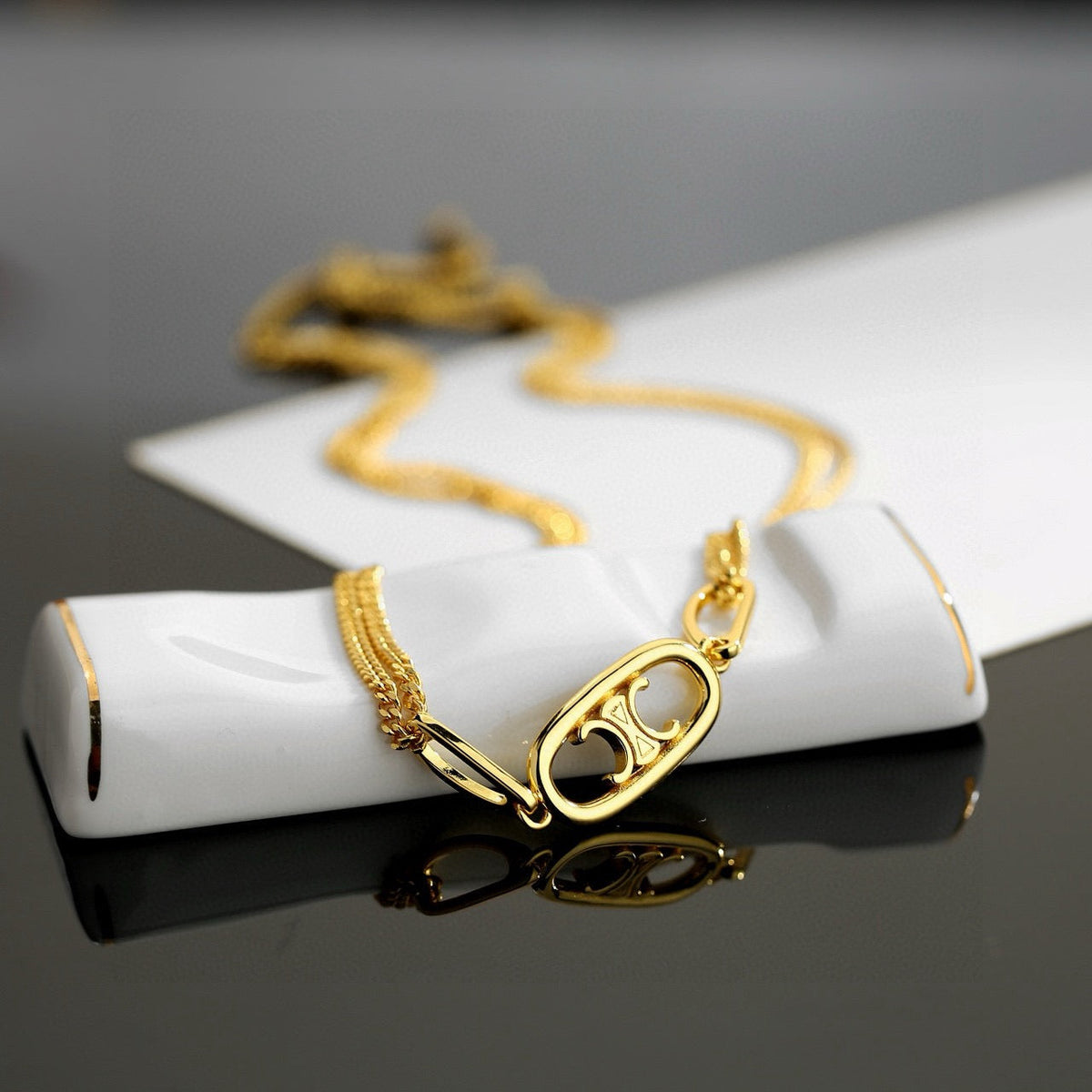 Martin Graham jewelry accessory in polished metal-tone – detail view