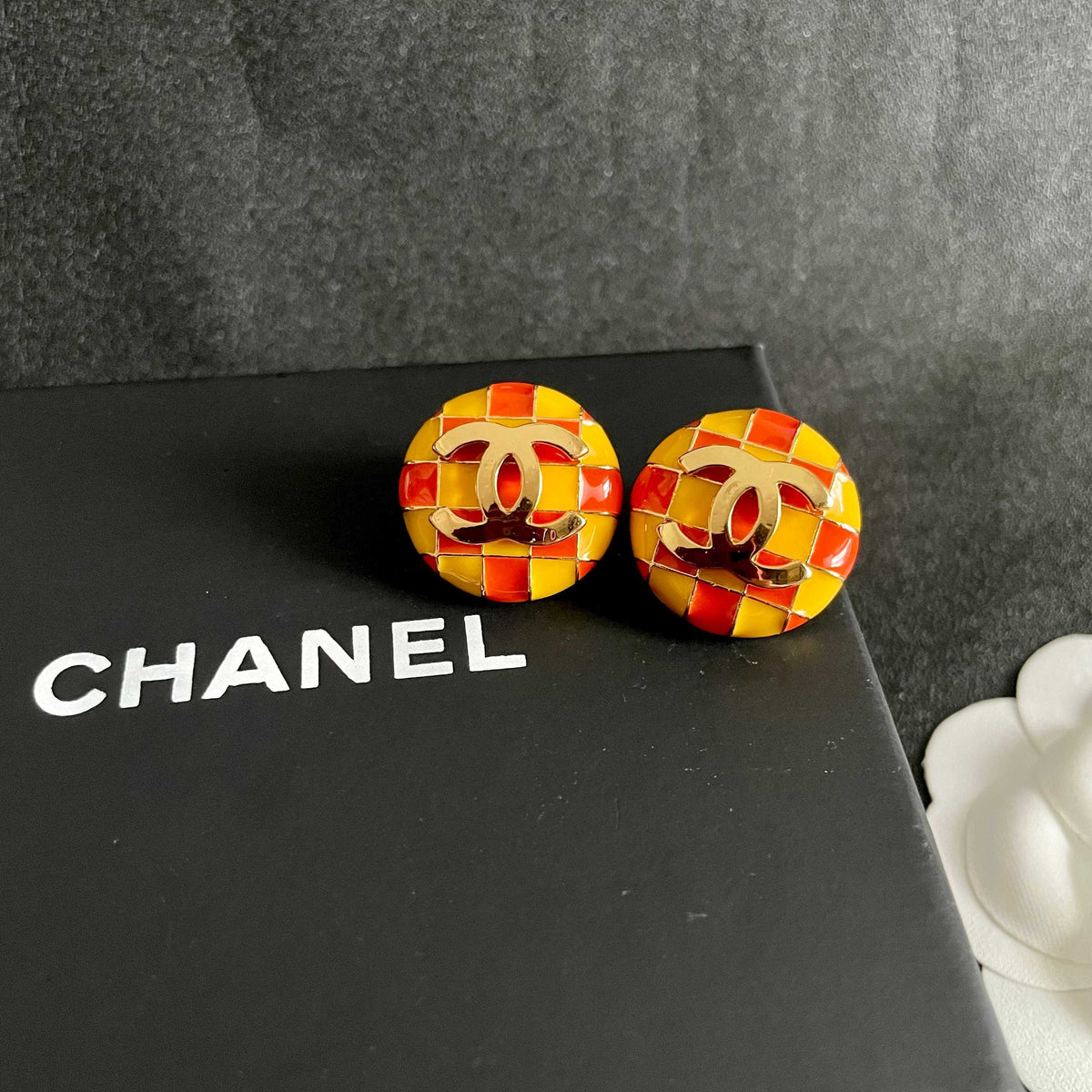 Martin Graham stud earrings in polished metal-tone – detail view