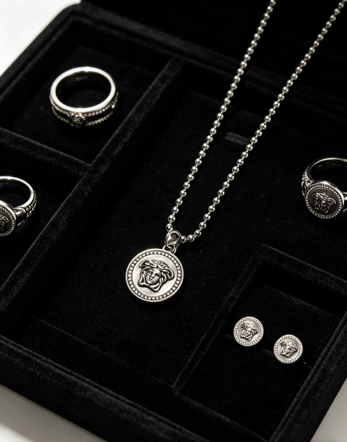 Martin Graham pendant necklace in polished metal-tone – detail view