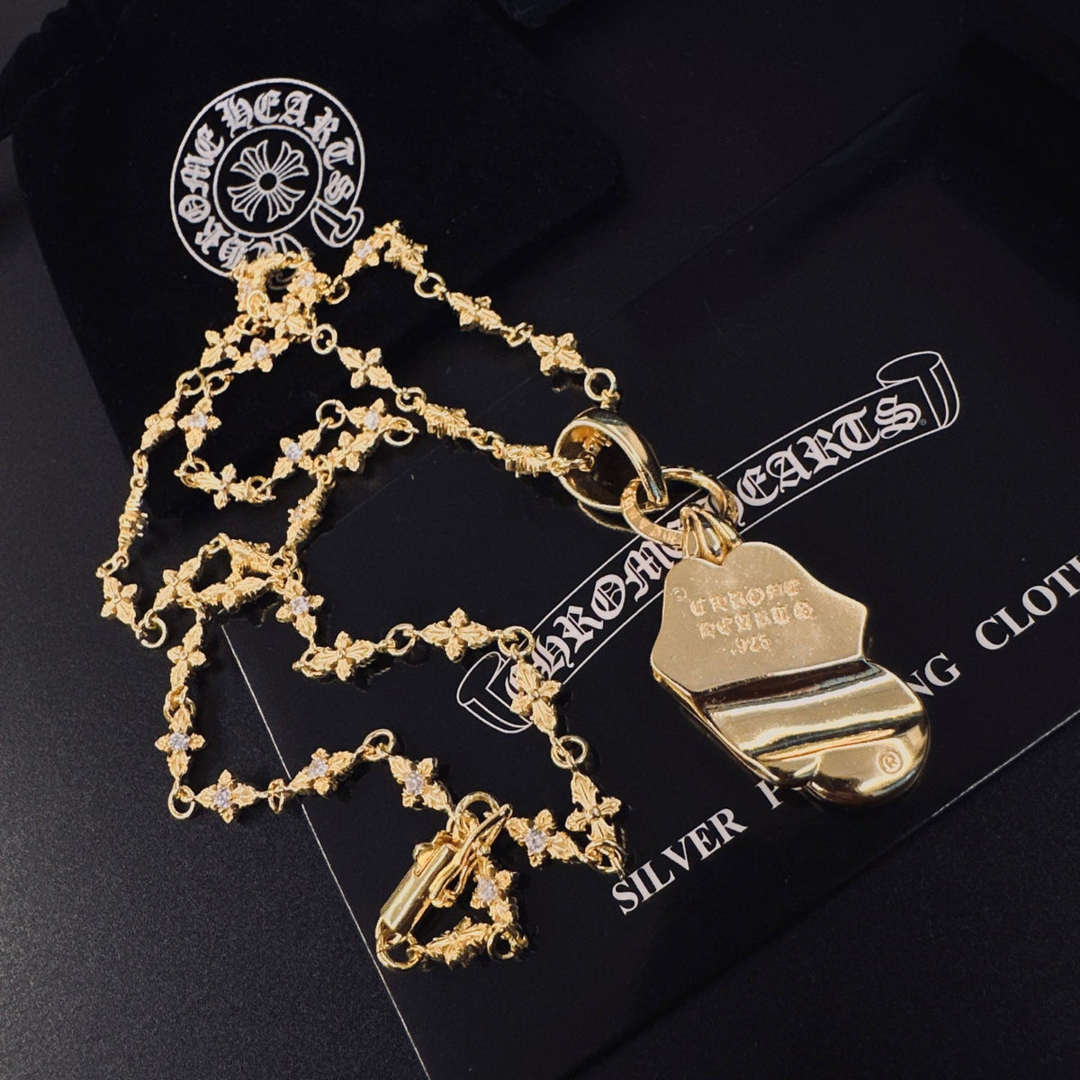 Martin Graham pendant necklace in polished metal-tone – detail view